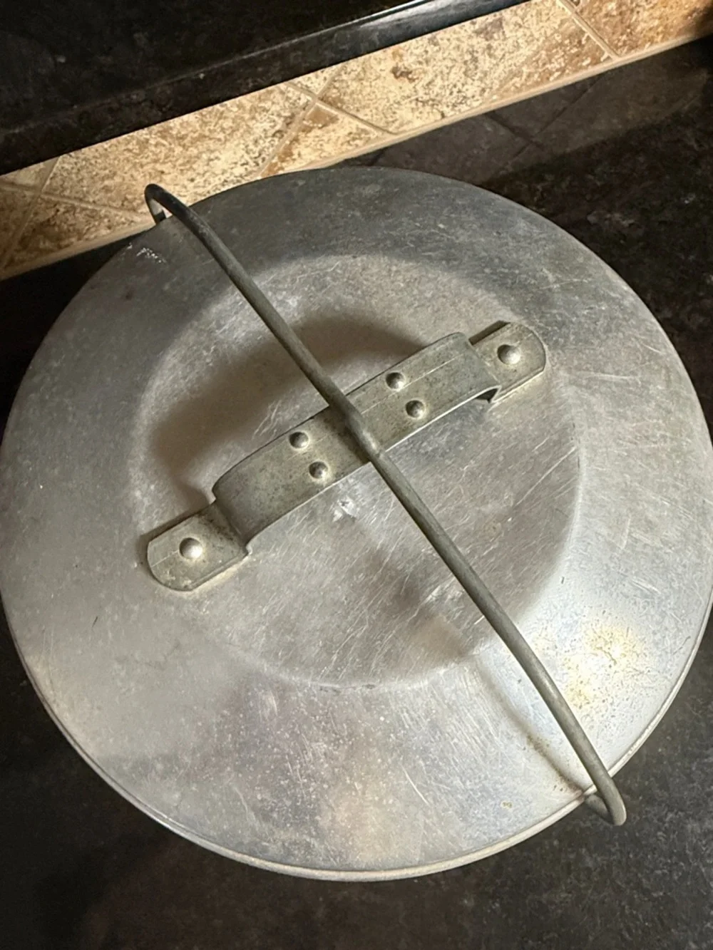 This vintage item is a Regal Aluminum Picnic Carrier.